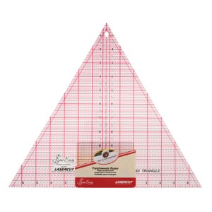 May include: A clear plastic 60-degree triangle patchwork ruler with red grid lines. The ruler is labelled "Sew Easy Lasercut Patchwork Ruler" and "60 Triangle".