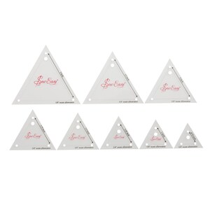 May include: Set of eight white plastic triangle quilting rulers with a red "Sew Easy" logo and measurements in inches. The rulers are for 1/4 inch seam allowance.