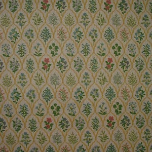 May include: A repeating pattern featuring stylized flowers and foliage in green, pink, and blue, set against a cream background. The design is framed by a gold trellis, creating a textured, vintage aesthetic. Ideal for wallpaper or fabric.