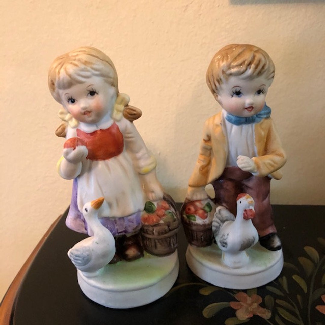 Vintage Figurine Set Boy and Girl Sweeping With Baskets of Apples Free Shipping Goose Etsy