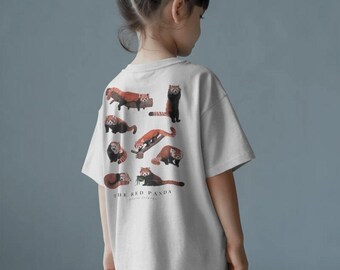 May include: A light gray t-shirt featuring multiple illustrations of red pandas in various poses. The text "THE RED PANDA" is printed below the illustrations. The shirt is being worn by a person.