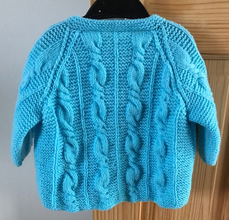 hand knitted size 18 months Aran style baby jacket