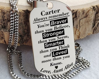 May include: Silver necklace with a dog tag pendant that reads "Carter Always remember You're Braver than you Believe, Stronger than you Seem, Smarter than you Think and Loved more than you Know. Love, Aunt Alise"