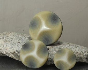 Sets or individual textured neutral grey/brown coloured shank buttons