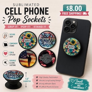 May include: Five circular cell phone pop sockets with various designs including a floral pattern with the text NANA, a diamond pattern with the text SPOILED WIFE, an American flag with a silhouette, and a Harley-Davidson logo, measuring 1.5 inches.
