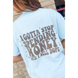 Gotta Stop Spending Money Graphic Tee | Stop Spending Money Pocket Tee