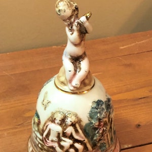 CAPODIMONTE PORCEAIN BELL ~*~ 1950s ~*~ In Very Good Condition ~*~ Cherub Playing Flute on Top ~*~ Beautiful Bell Sound ~*~ Hand Painted
