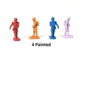 May include: Four painted toy soldiers, each in a different color: red, orange, blue, and purple. The soldiers are standing on a white surface. 4 Painted