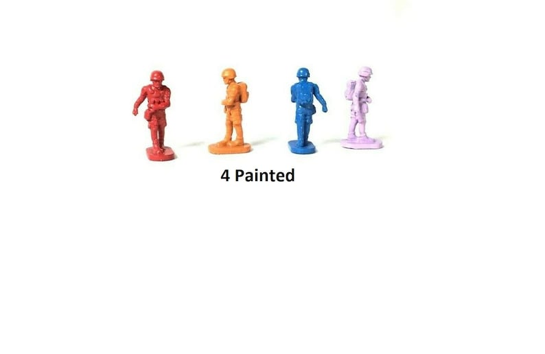 May include: Four painted toy soldiers, each in a different color: red, orange, blue, and purple. The soldiers are standing on a white surface. 4 Painted