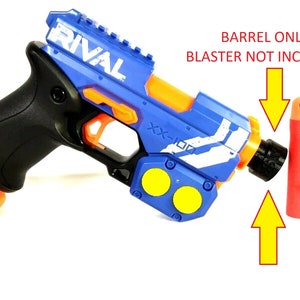 May include: A blue and orange Nerf Rival XX-100 blaster barrel extension. The barrel extension is red and has a black tip. The text "BARREL ONLY BLASTER NOT INCLUDED" is written in white on a black background above the barrel extension.