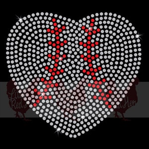 May include: A red and white heart-shaped design made of rhinestones. The heart is filled with small white rhinestones and a red design in the centre.