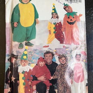 May include: Vintage sewing pattern for children's Halloween costumes. The pattern includes instructions for making costumes such as a dinosaur, clown, pumpkin, witch, leopard, and bunny. The pattern envelope is white with the text "BUTTERICK" and "5142".