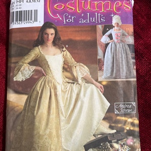 May include: A Simplicity sewing pattern for adult costumes. The pattern is for a historical gown with a long skirt and a fitted bodice. The pattern includes instructions for making a matching child's costume. The pattern number is 4092 and the sizes are 6, 8, 10, and 12. The pattern is for sizes 32-38 and 34-40.