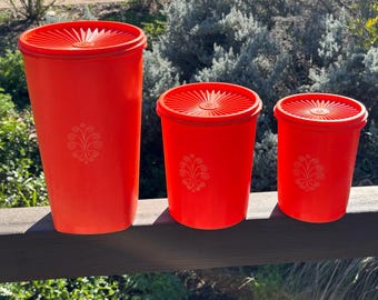 Vintage Tupperware canister set of three in happy orange flower pattern 6 pieces