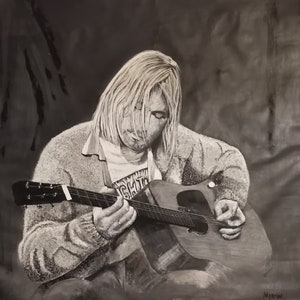 Kurt Cobain of Nirvana taken from the famous MTV unplugged set. smells like teen spirit and Nevermind are iconic Grunge songs.
