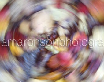 Photograph of red yellow and brown leaves done swirly