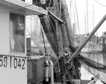 Photograph of working fishing boat in Rockport, Tx in black and white