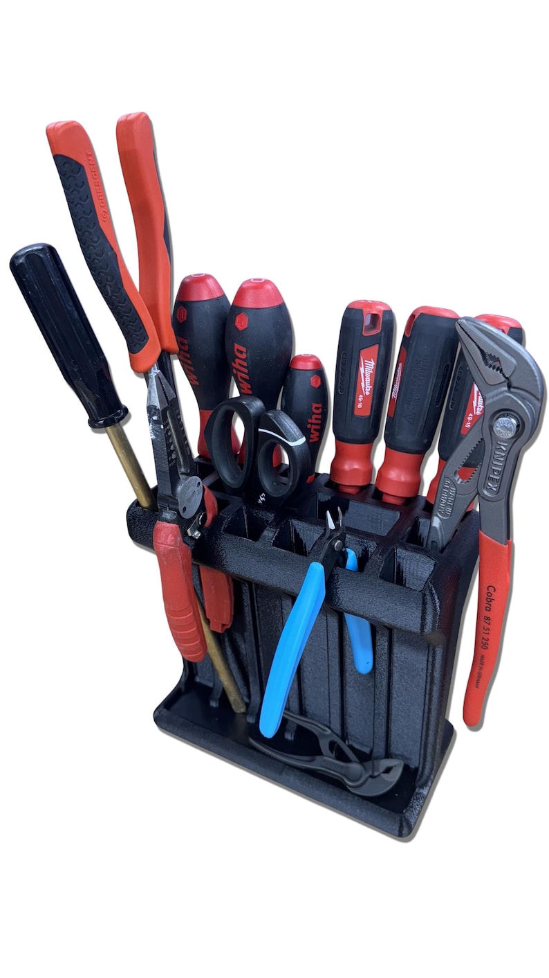 3D printed tool organizer with 16 slots, including extra-wide ones, for screwdrivers, pliers, wrenches, and more. Keeps tools organized and easily accessible.