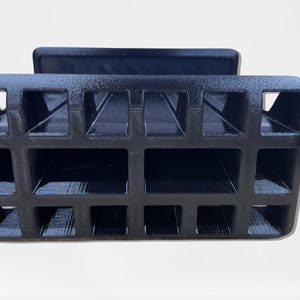 3D printed tool organizer with 16 slots, including extra-wide ones, for screwdrivers, pliers, wrenches, and more. Keeps tools organized and easily accessible.