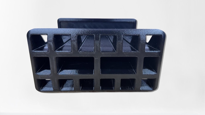 3D printed tool organizer with 16 slots, including extra-wide ones, for screwdrivers, pliers, wrenches, and more. Keeps tools organized and easily accessible.
