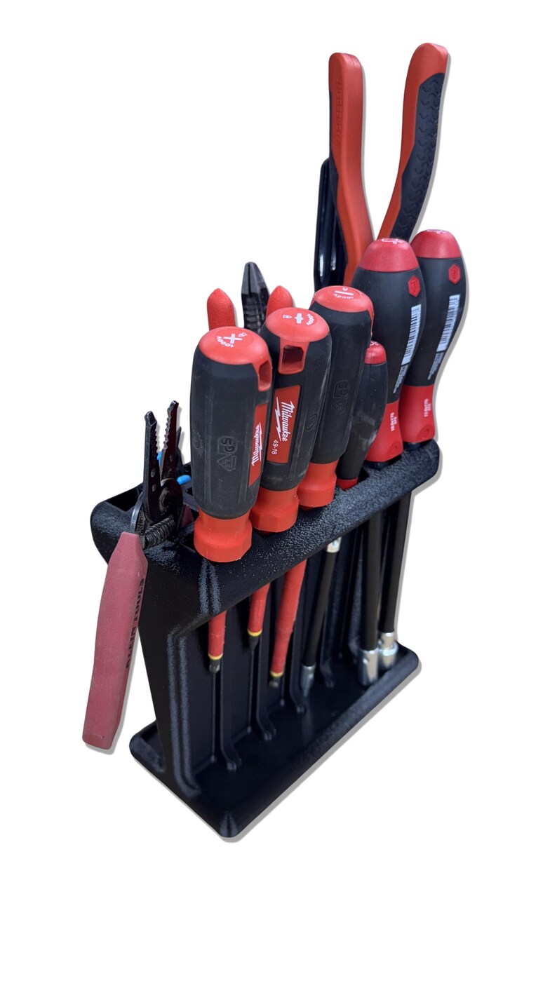 3D printed tool organizer with 16 slots, including extra-wide ones, for screwdrivers, pliers, wrenches, and more. Keeps tools organized and easily accessible.