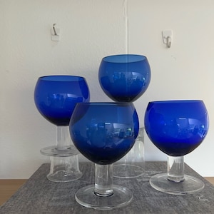 Set of four Vintage MCM Style Cobalt Blue Water Goblets with Clear Stem and Footed Base