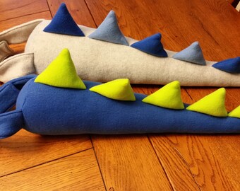 plush dinosaur tails