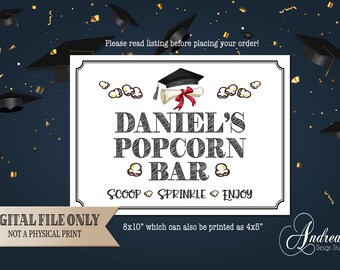 May include: A graduation-themed sign with the text "DANIEL'S POPCORN BAR". The sign includes a graduation cap, diploma, and popcorn graphics. The sign is a digital file, available in 20x25 cm, and can also be printed as 10x13 cm.