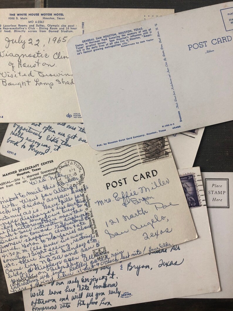 May include: A collection of vintage postcards with handwritten messages. The postcards feature images of the Manned Spacecraft Center in Houston, Texas, and General Sam Houston. One postcard has a handwritten message that reads "Mrs. Coffee Miller of Bryan, 121 North Poe, San Angelo, 26405".