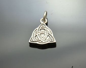 May include: Silver pendant featuring a Celtic knot design in the shape of a triangle.