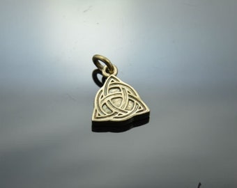 May include: A gold-toned metal pendant featuring a Celtic knot design in the shape of a triangle.