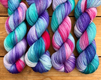 Hand Dyed Sock Yarn / 4ply Yarn. Pinks, Purples and Turquoise for knitting or crochet. Merino and Nylon blend, 425m per skein