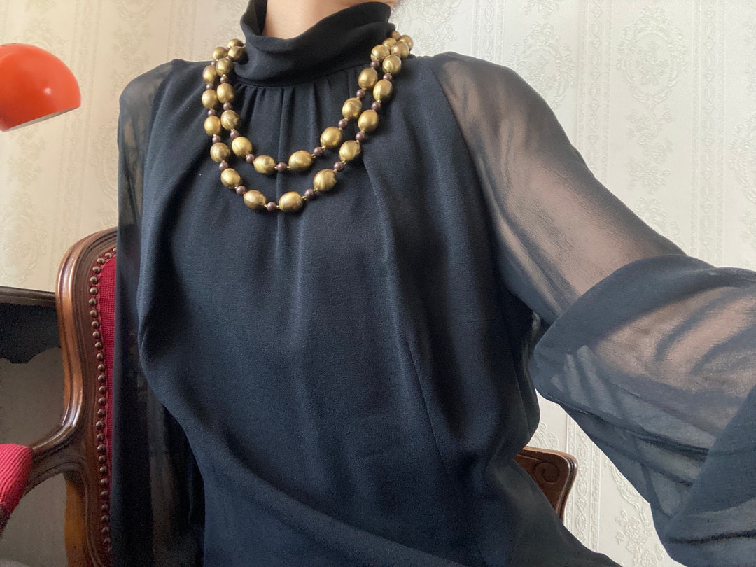 Black High Neck Sheer Sleeved Dress With Metal Trims