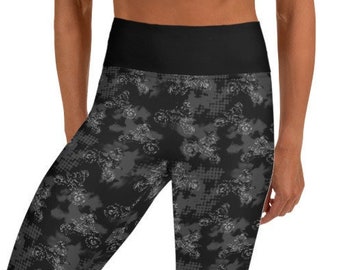 May include: Black yoga leggings with a high waist and a gray and black camouflage pattern.