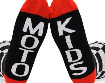May include: Black and white striped socks with red trim. One sock says "MOTO" and the other says "KIDS".