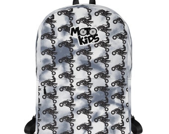 May include: A gray and white tie-dye backpack with a black silhouette of a person riding an ATV repeated across the surface. The backpack has a black logo that says "Moto Kids" in white letters.