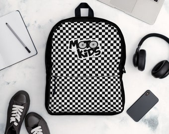 May include: Black and white checkered backpack with a black logo that says "Moto Kids" and a bicycle graphic.