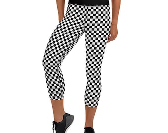 May include: Black and white checkered cropped leggings with a black waistband.
