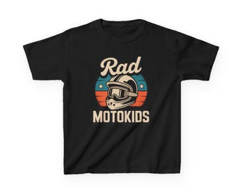 May include: Black t-shirt featuring a retro design with the words "Rad MOTOKIDS" above and below a motorcycle helmet graphic. The helmet is white with black accents, set against a backdrop of red, blue, and orange stripes and stars.