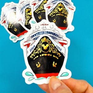 May include: A collection of die-cut stickers featuring a black and red cruise ship design with gold accents and a Mickey Mouse emblem. The stickers have a white border and are surrounded by blue water details.
