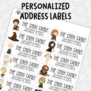 May include: Sheet of personalized address labels featuring illustrations of characters. Each label includes "THE SMITH FAMILY" and address details: 1234 Main Street, Orlando, FL 32612. The labels are white with black text.