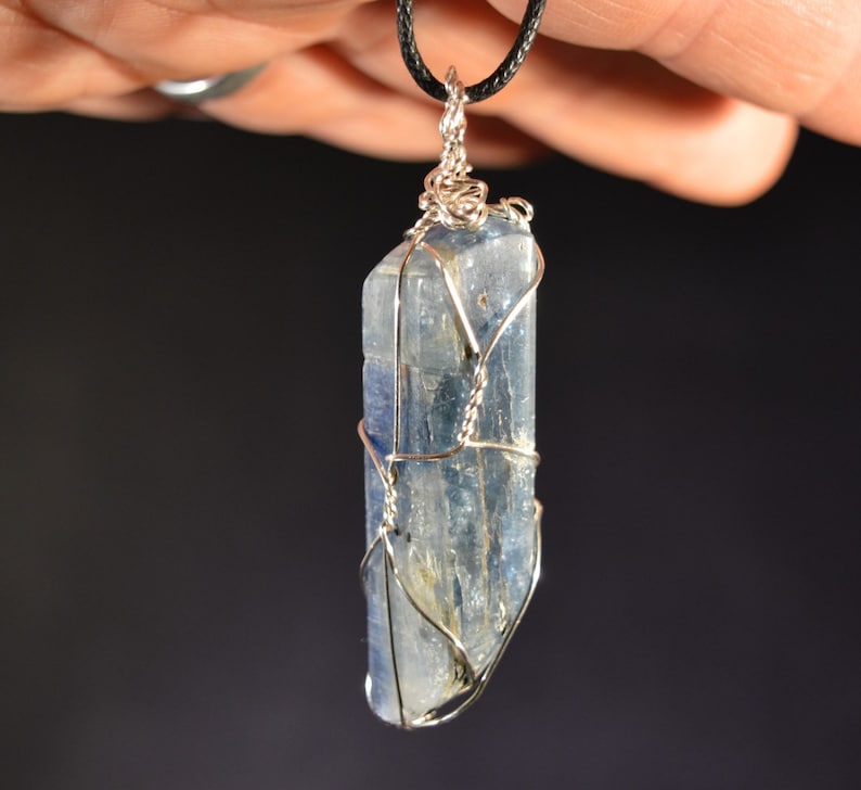 Kyanite Crystal Pendant or Amulet Wire Wrapped smooth crystal on adjustable cord
