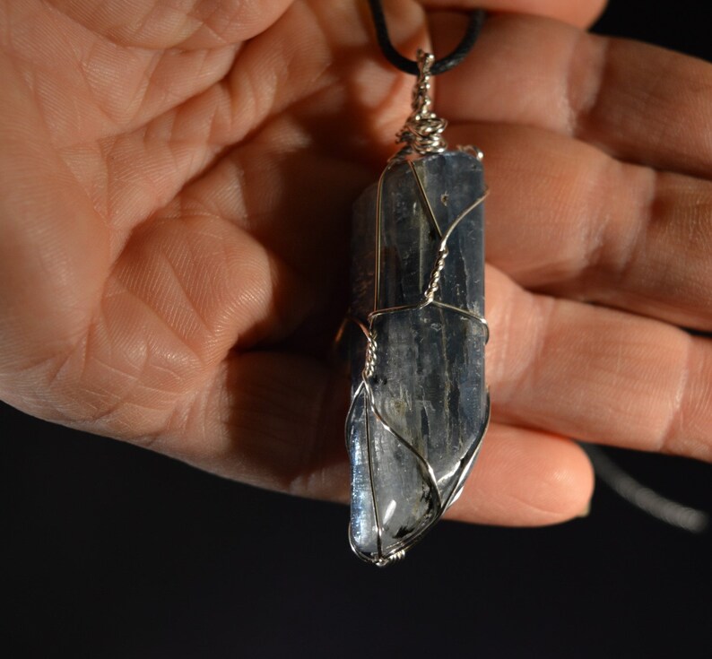 Kyanite Crystal Pendant or Amulet Wire Wrapped smooth crystal on adjustable cord