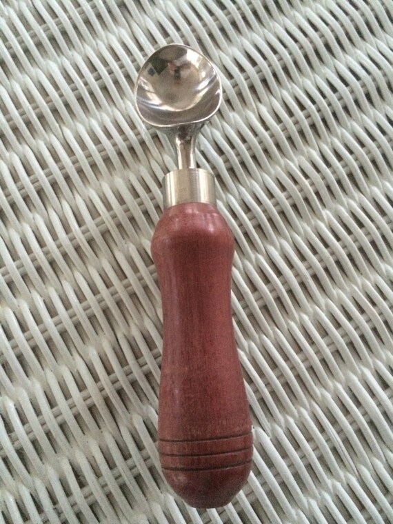 Ice Cream Scoop, stainless steel with Purpleheart handle.