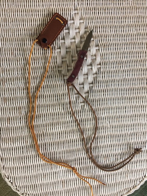 Knife, fixed blade, neck lanyard sling and sheath