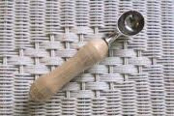 Ice Cream Scoop, stainless steel with Maple handle.