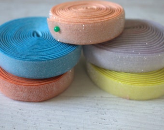 5/8" velours pailleté/élastique jaune, bleu clair corail, pêche, lavande