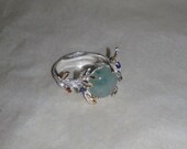Solid sterling silver Jadeite Jade untreated gemstone ring , blue sapphire red zircon gold plate surround , tree branch nest leaves design