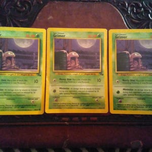 151 pokemon cards etb Pokemon Muk Holo Rare 13/62 Fossil Unlimited, 1999, Wizards, TCG –  CardboardandCoins.com main image 1