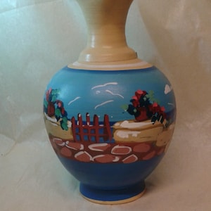 A handmade and handpainted Greek museum replica vase